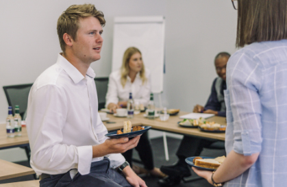Image of a meeting taking place in a conference room